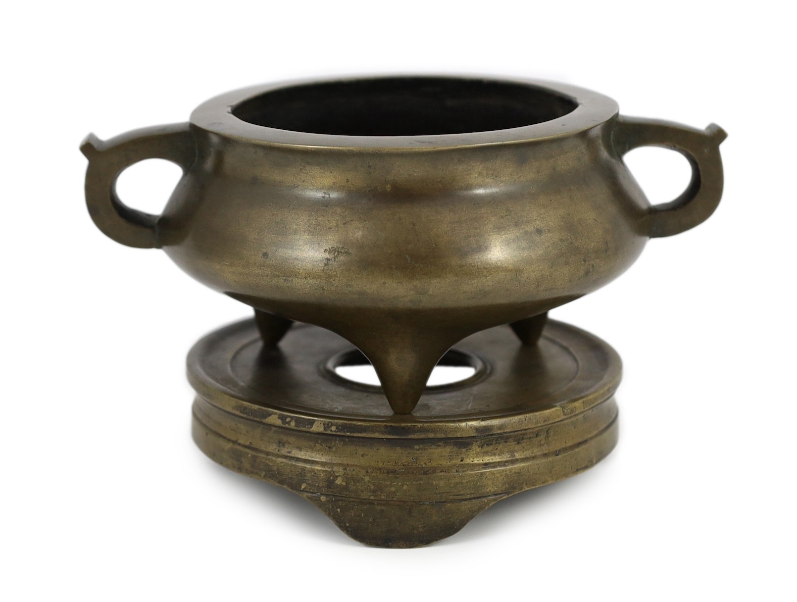 A Chinese bronze censer and stand, ding, 18th/19th century, 18.7cm wide, 11cm high